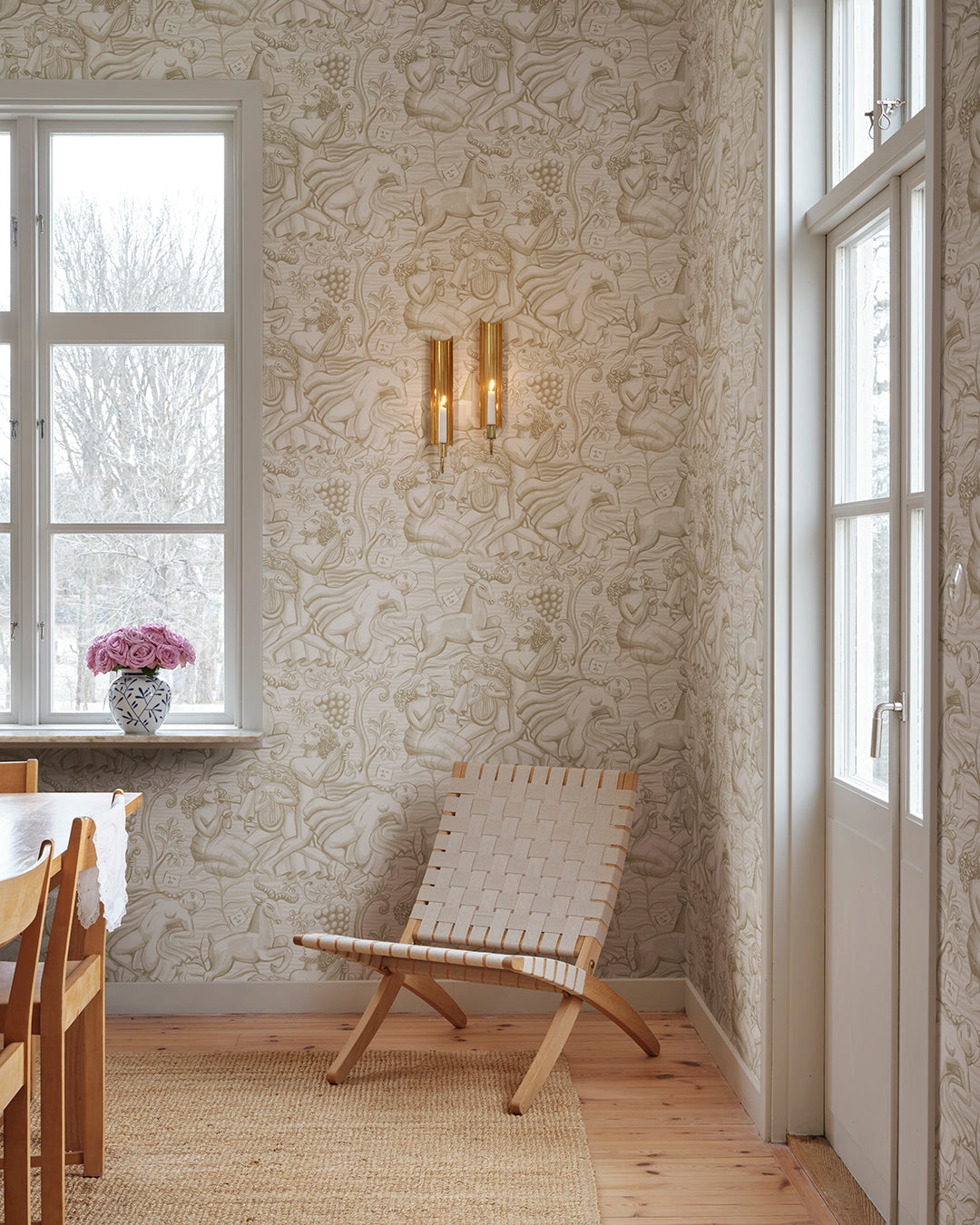Carl Milles and Anna Petrus's imprint on design history was the source of inspiration for this elegant wallpaper mural. In a calming sand hue, Baccus evokes a sense of timeless beauty.