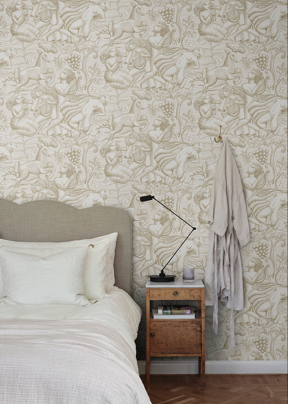 Carl Milles and Anna Petrus's imprint on design history was the source of inspiration for this elegant wallpaper mural. In a calming sand hue, Baccus evokes a sense of timeless beauty.