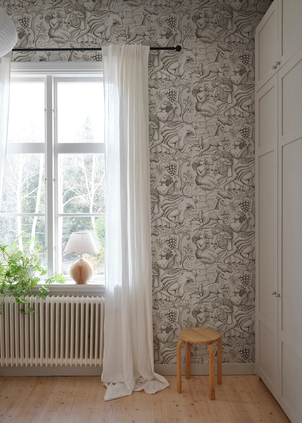 Carl Milles and Anna Petrus's imprint on design history was the source of inspiration for this elegant wallpaper mural. In graphite, Baccus evokes a sense of timeless beauty.