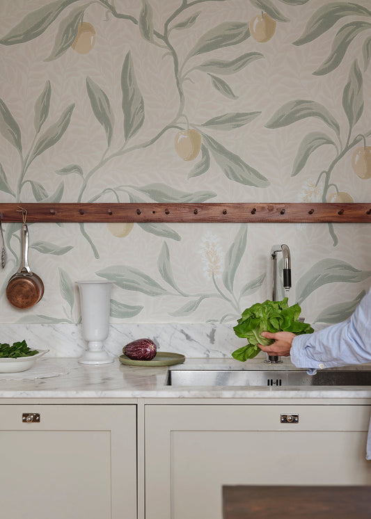 The litchi fruits in our favorite Vinnie wallpaper mural decorate the winding branches and create a lush, classic look. 