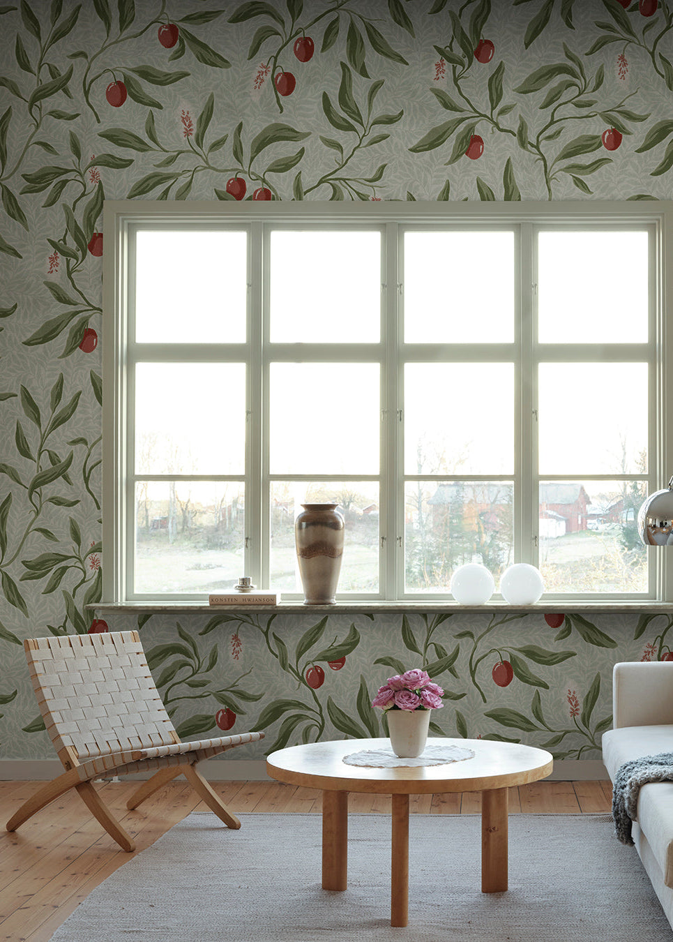 The litchi fruits in our favorite Vinnie wallpaper mural decorate the winding branches and create a lush, classic look