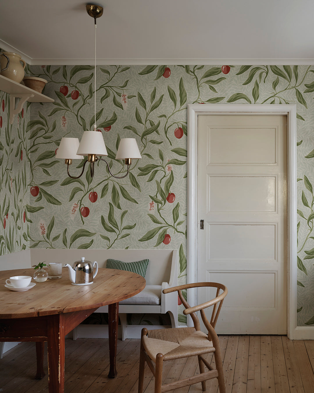 The litchi fruits in our favorite Vinnie wallpaper mural decorate the winding branches and create a lush, classic look