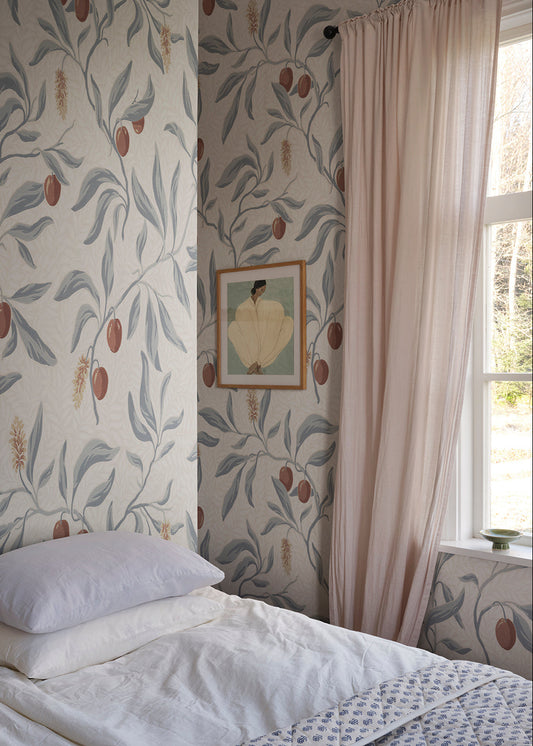The litchi fruits in our favorite Vinnie wallpaper mural decorate the winding branches and create a lush, classic look. 