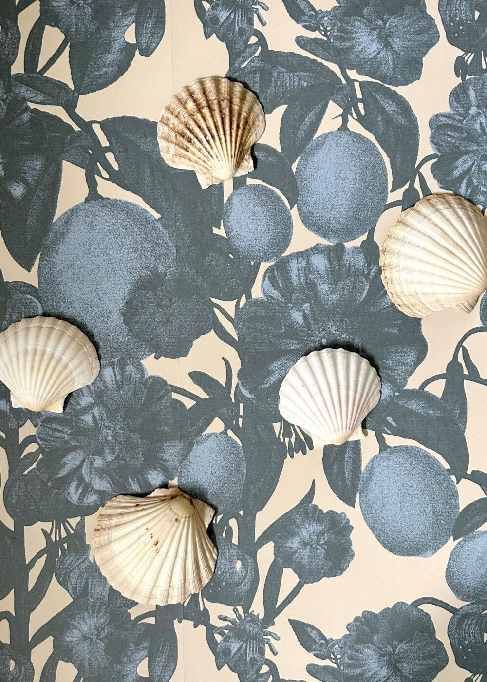 Studio Lisa Bengtsson style with a small insect hidden among the lush plants. Now the pattern is also available as wallpaper in wonderfully magical blue and a green tone.