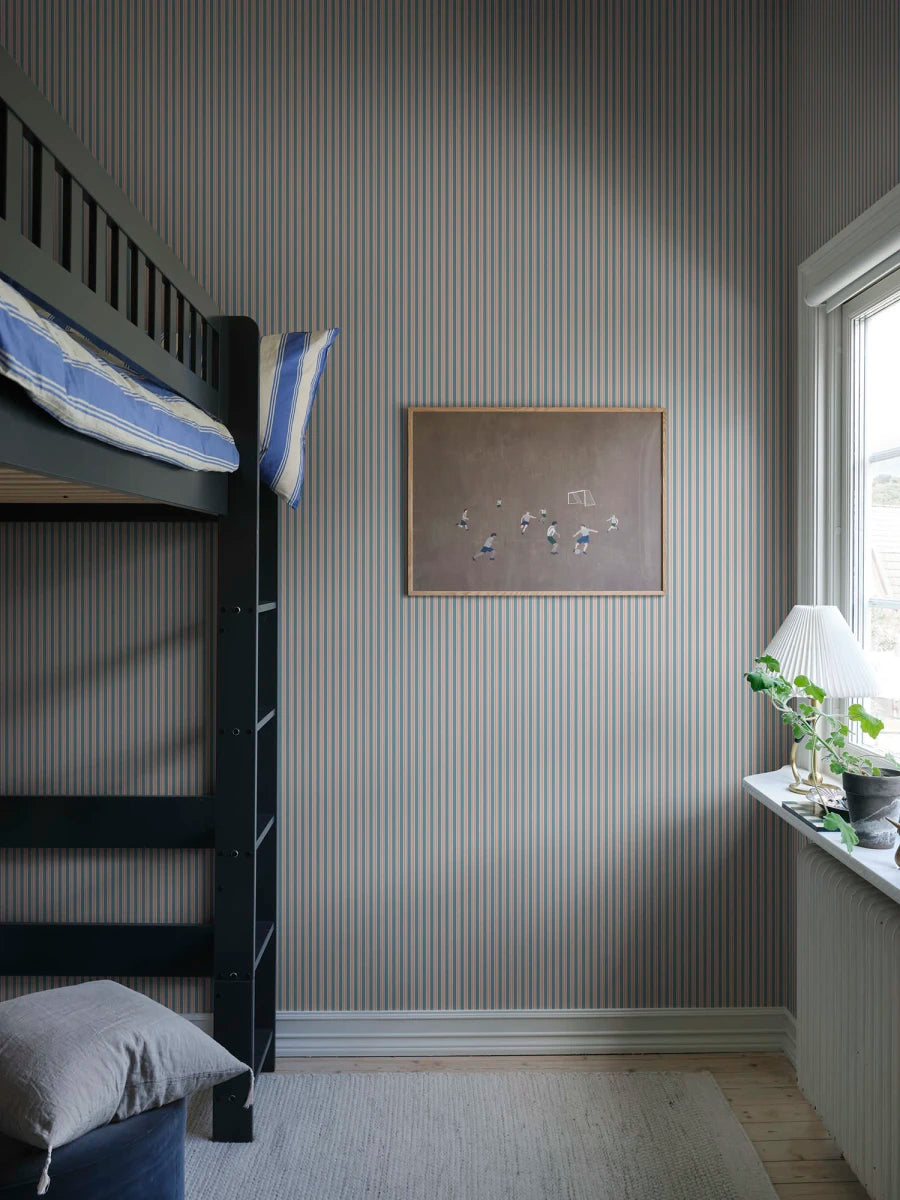 A cool striped wallpaper with a soft textile character in exclusive colors that dress the walls both luxuriously and stylishly.