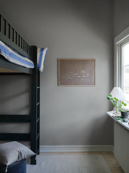 A cool striped wallpaper with a soft textile character in exclusive colors that dress the walls both luxuriously and stylishly.