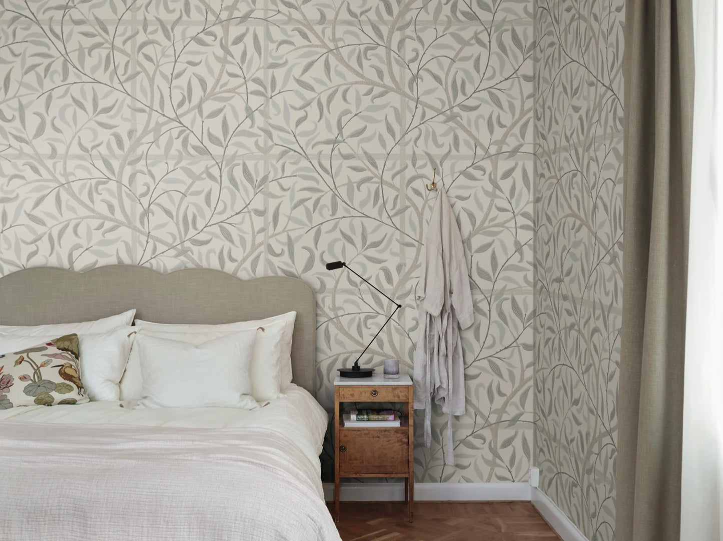 It's a lovely wallpaper with trellis that embraces the room and makes it lush year-round.