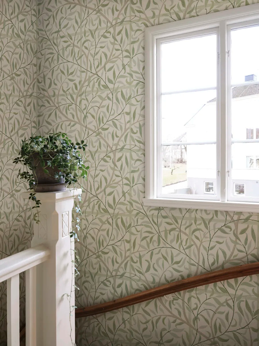 Emmie is an enlarged version of our popular wallpaper pattern Diana found in our archives. It's a lovely wallpaper with trellis that embraces the room and makes it lush year-round.