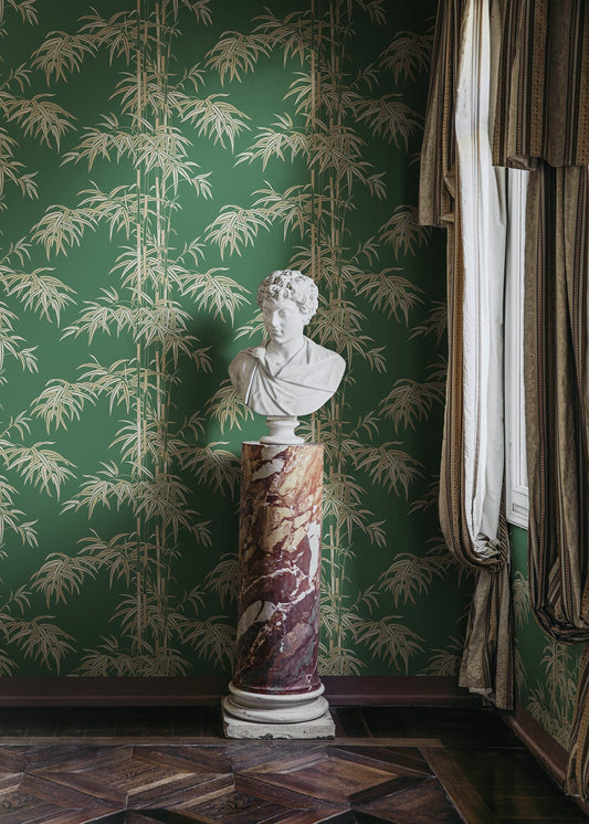 The wallpaper Leon, Green has a rich green background with beige and lighter green accents.