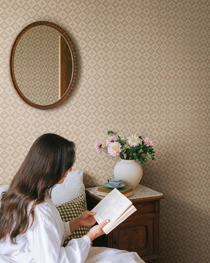 This classic trellis was one of the most popular wallpaper patterns of the 1800s and likely originally covered a ceiling. Today it decorates the walls just as beautifully. The color scheme, Terracotta, comes in lovely tones of red terracotta and beige.
Designed by Studio Sandberg