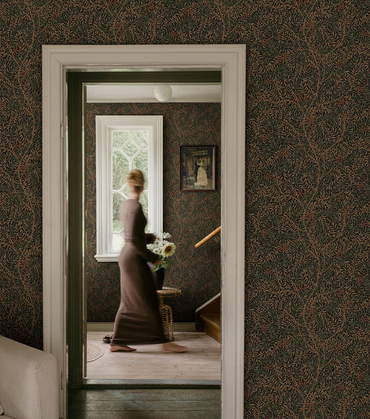  A harmonious surface-printed wallpaper pattern featuring intricate rowan berry branches creates a cozy and welcoming atmosphere with its stylized and enveloping design. 