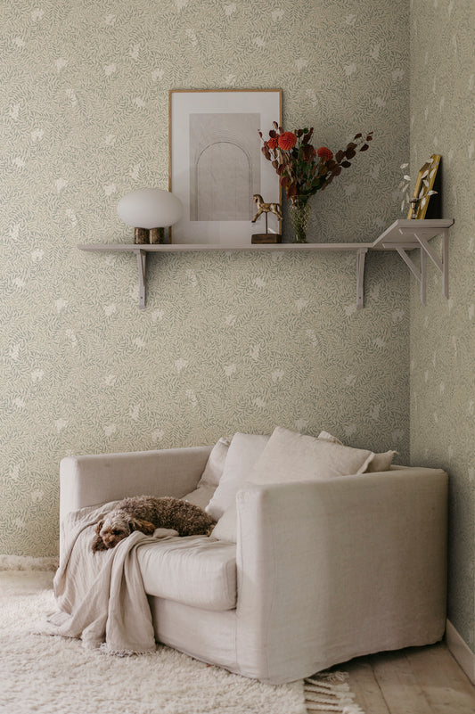 A harmonious surface-printed wallpaper pattern featuring intricate rowan berry branches creates a cozy and welcoming atmosphere with its stylized and enveloping design.