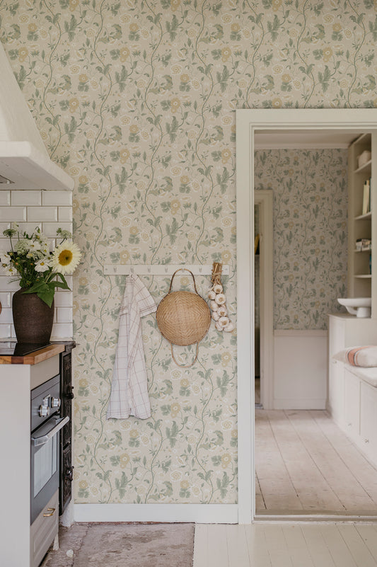  Japanese anemones, cup-and-saucer vines, and avens intertwined offer a softly verdant Arts &amp; Crafts-inspired wallpaper with intricate details and an enveloping character. 
