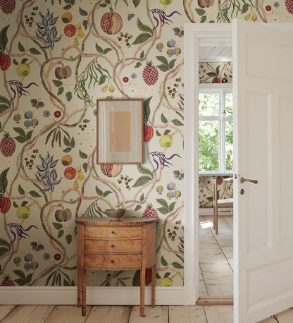 A wallpaper with a playfully hand-painted fantasy tree inspired by plants from Plantae Selectae, adorned with intertwining decorative fruits.