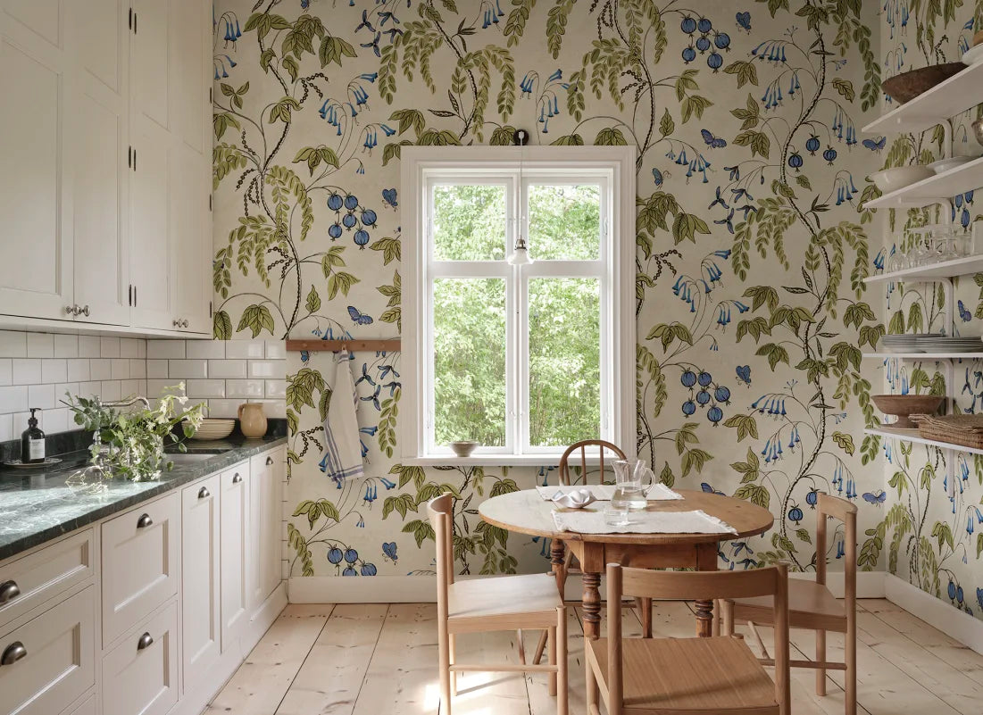  Ottilia, Olive Green wallpaper presents a soft cream background with vibrant green, purple, and soft blue florals.
 