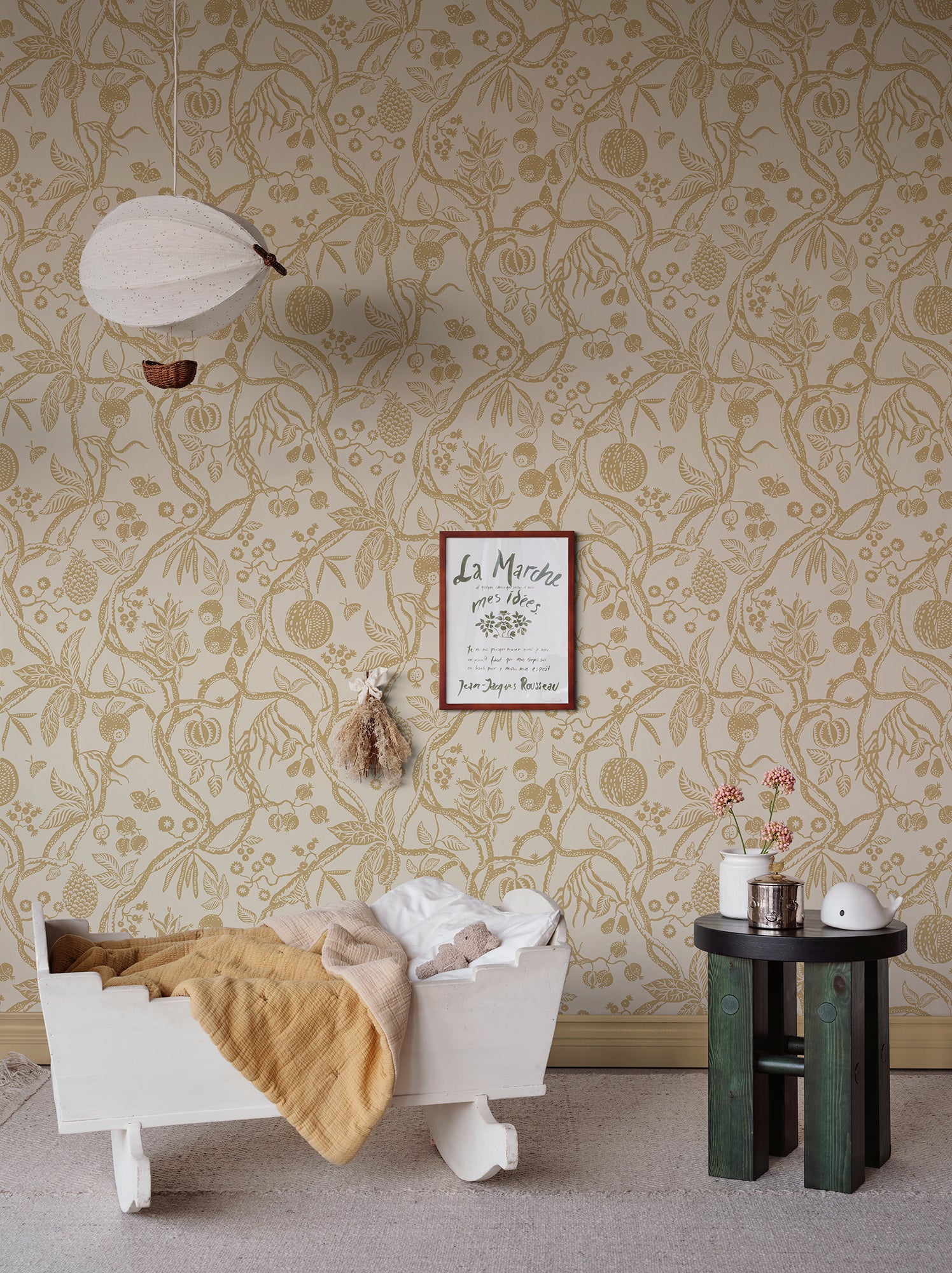 The Tree of Life wallpaper in a warm honey hue captures the essence of nature’s elegance with exotically winding branches and intricate details.