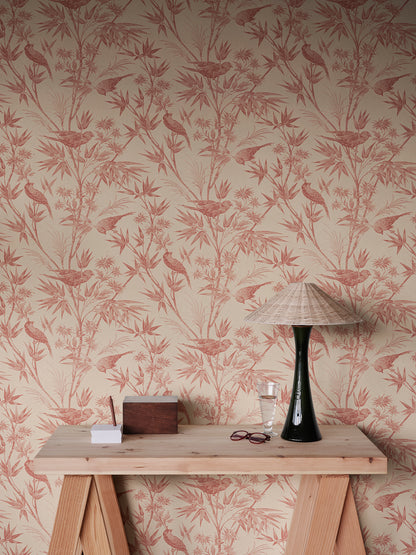  Embrace the classic toile charm of the Celeste wallpaper in a warm red palette. 