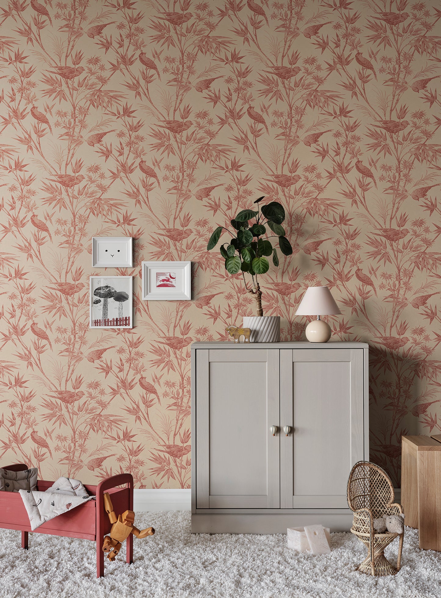  Embrace the classic toile charm of the Celeste wallpaper in a warm red palette. 