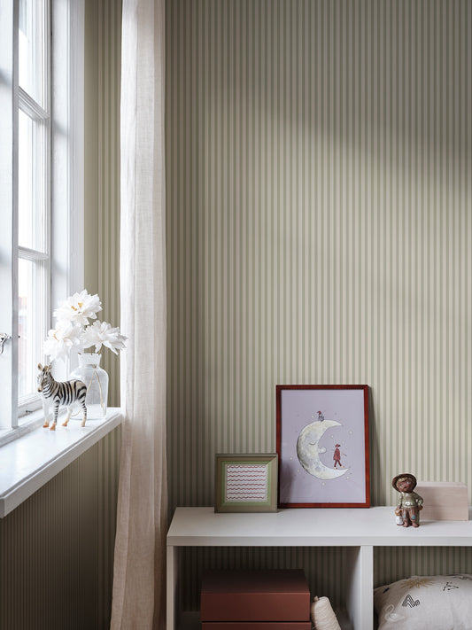  Elevate your room with our Estelle wallpaper in light green. 
