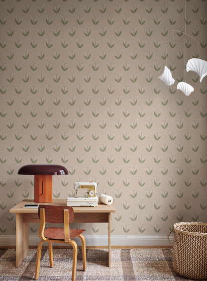  This wallpaper features lily of the valley in soft blush tones, capturing nature's grace with its relaxed and decorative form. 