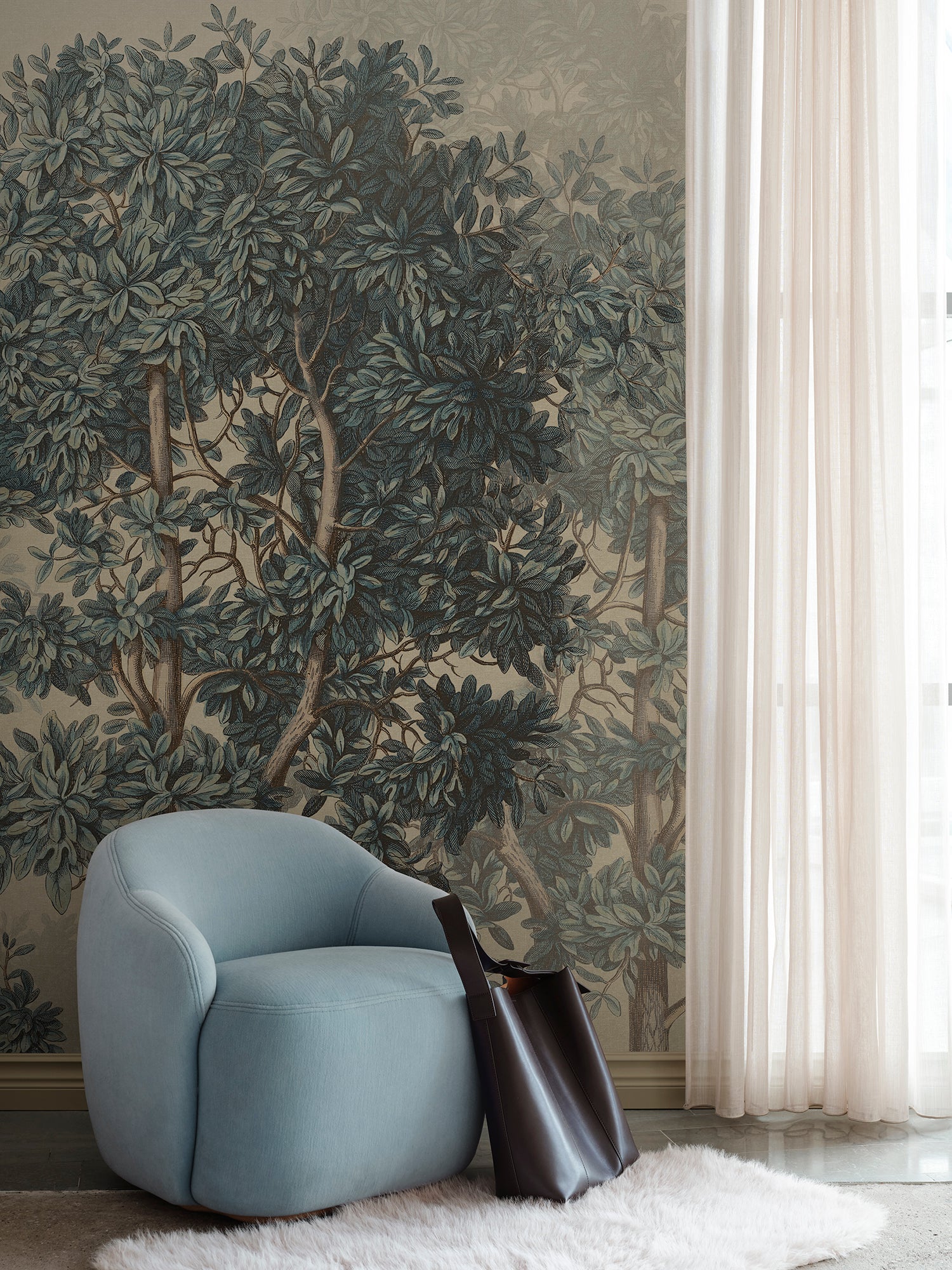 Let your walls whisper with the elegance of the Charles Mural. Inspired by Georg Ehret's botanical artistry, this mural captures a tranquil forest grove bathed in soft blue hues creating a vintage charm. 