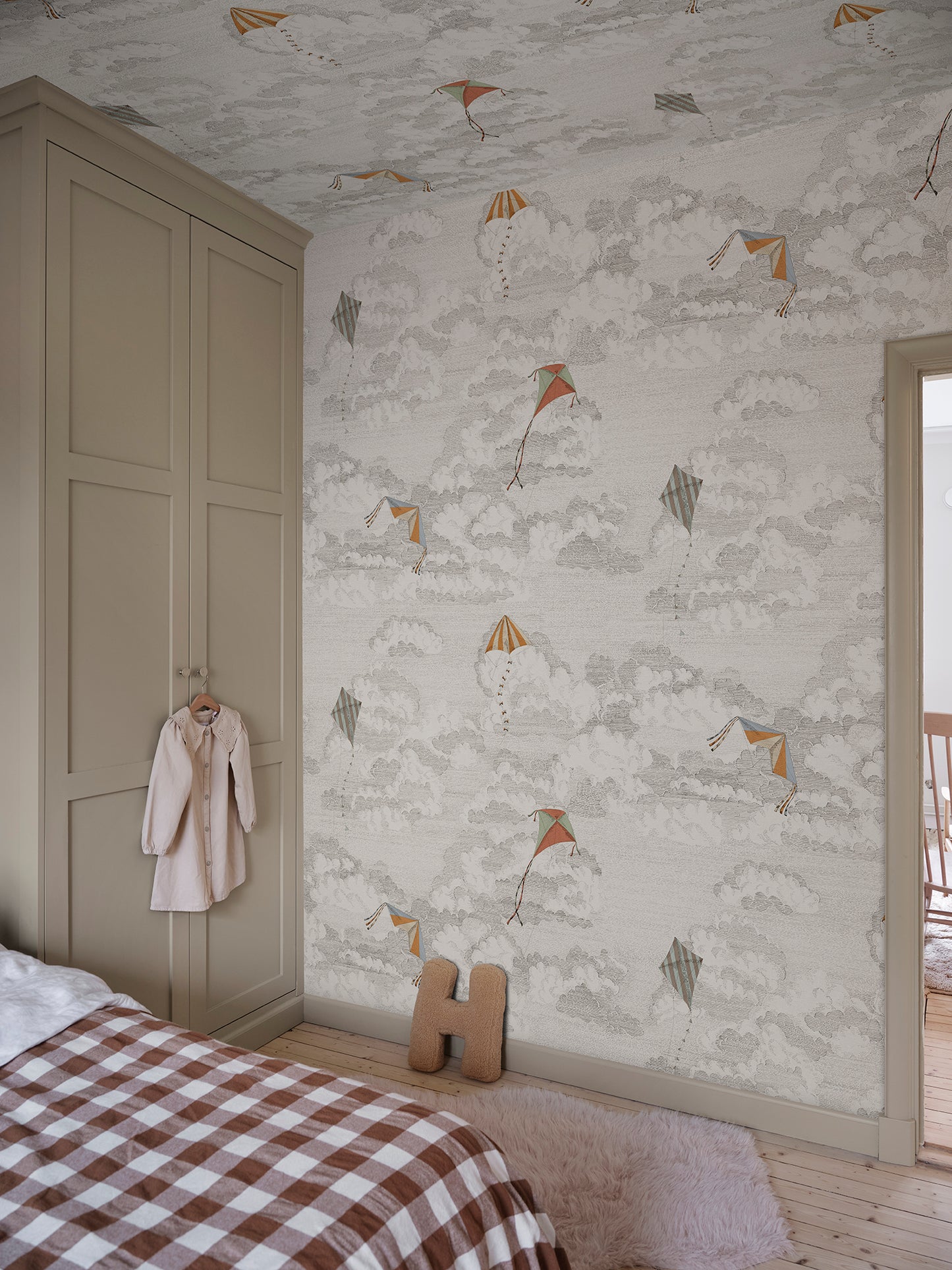 Bonnie and Kites wallpaper captures the playful whimsy of kites soaring across a hand-drawn sky.