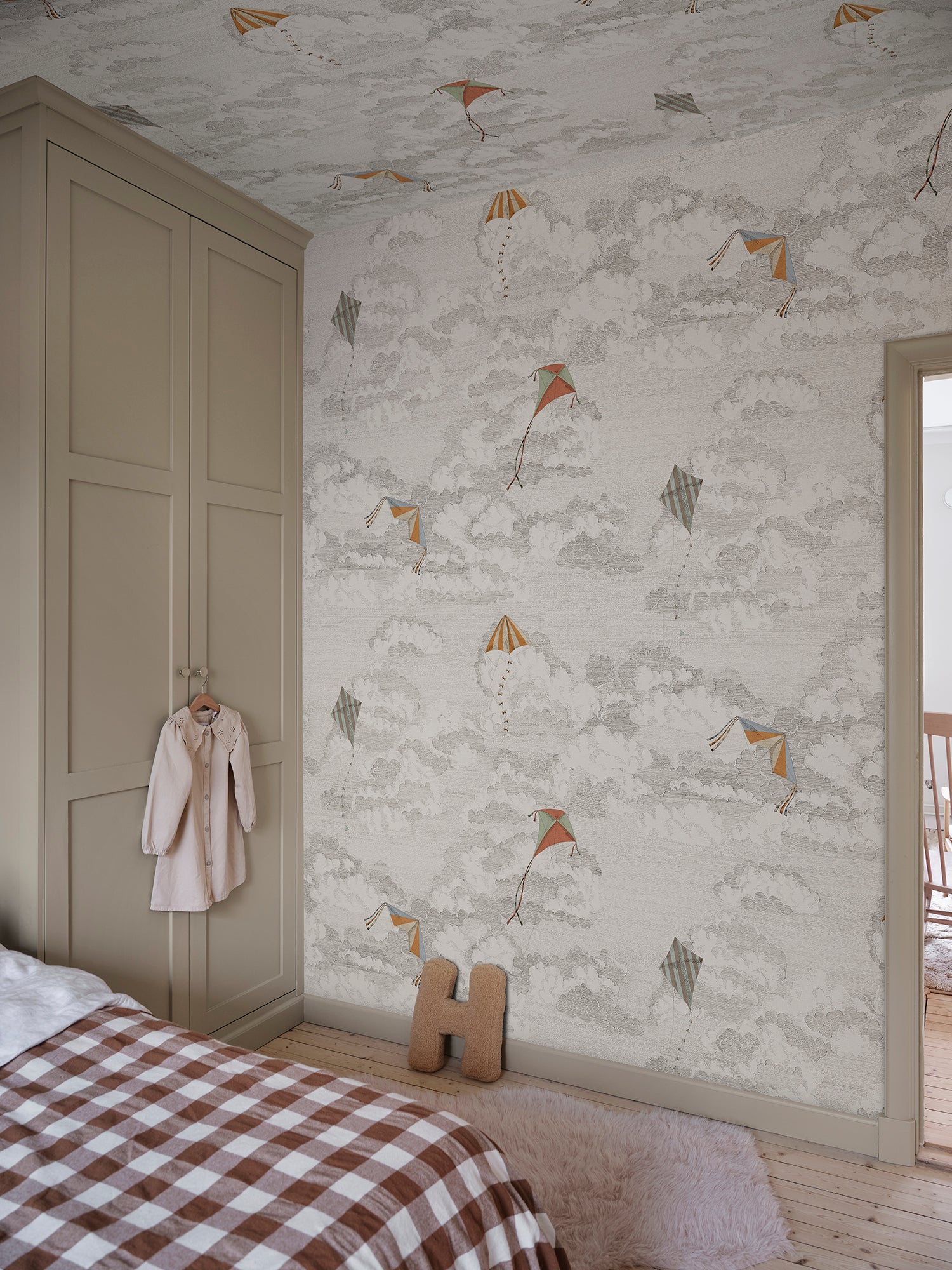 Bonnie and Kites wallpaper captures the playful whimsy of kites soaring across a hand-drawn sky.
