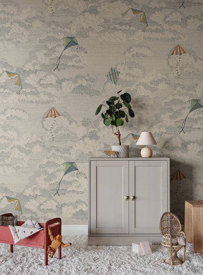 This whimsical wallpaper captures the nostalgia of flying kites against a dreamy sky filled with fluffy clouds.