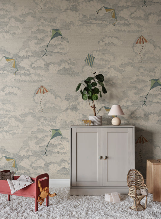 This whimsical wallpaper captures the nostalgia of flying kites against a dreamy sky filled with fluffy clouds.