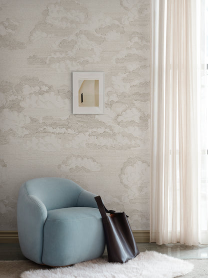 Bonnie invites tranquility with its hand-drawn clouds on wallpaper, evoking a dreamy atmosphere reminiscent of old etchings.