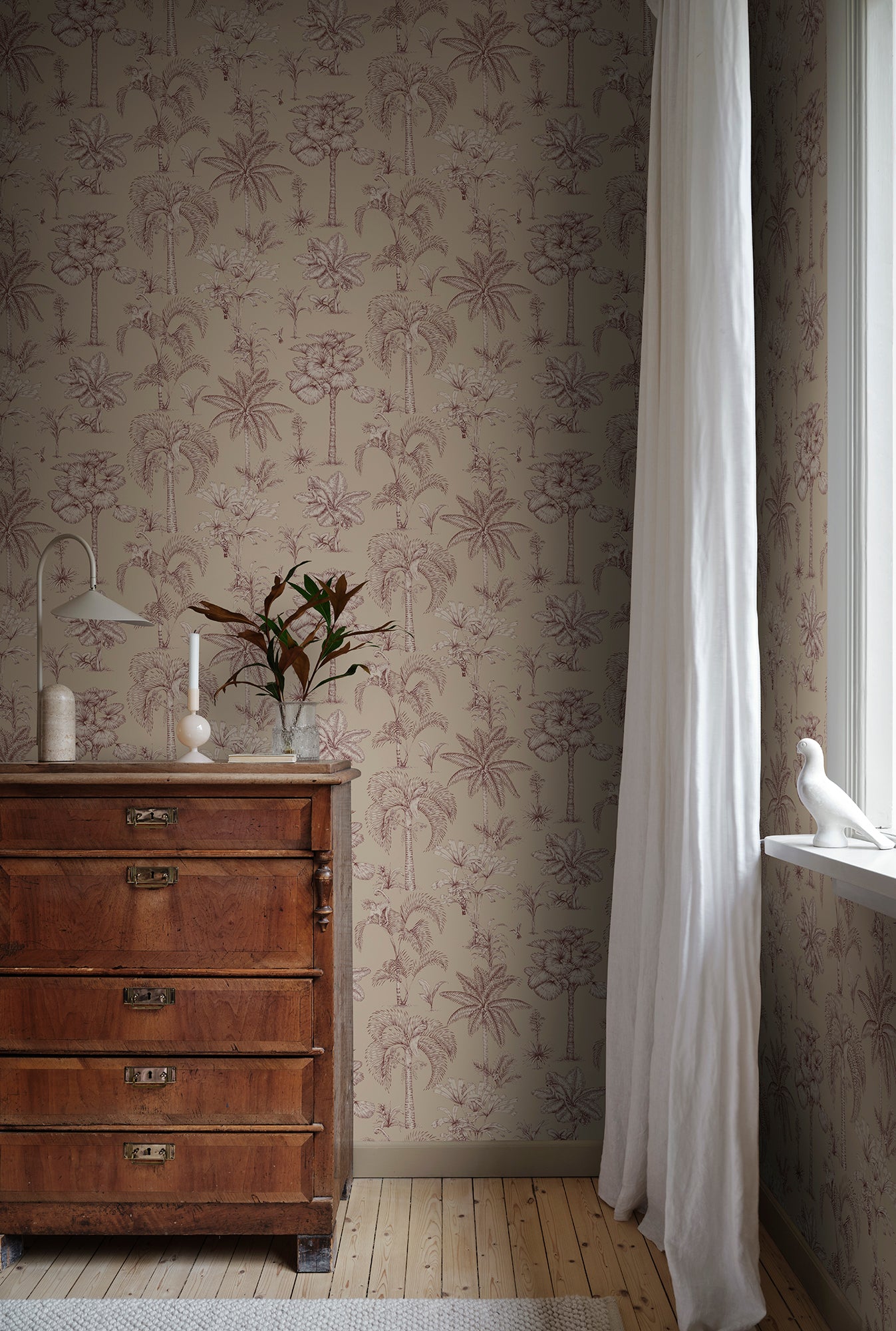 With the charm of a toile design, Adele Beige wallpaper invites intrigue with its intricately drawn jungle setting.