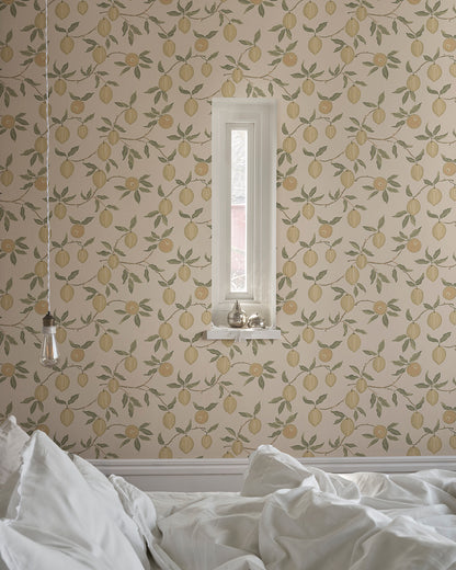 Let the captivating Limone wallpaper whisk you away to sun-drenched Italian groves. With its vibrant lemon branches and lush green leaves, this design refreshingly encapsulates the zest of life. Perfect for adding a splash of color and a touch of Mediterranean flair to your space.