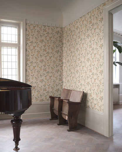Infuse your space with the delightful essence of Italian lemon groves with our Limone Blush wallpaper. Elegant blush lemons and soft green leaves meander gracefully on a warm backdrop, evoking the sunny vibrance of a Mediterranean escape. Perfect for adding a splash of nature's freshness and charm to any room.