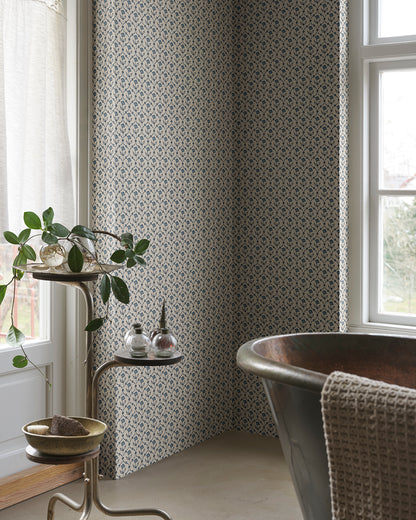 Elena Blue: A Timeless Floral Embrace
Elena in Blue offers a classic floral medallion design with echoes of domino paper and folk trellis patterns. This delicate print brings a touch of history, elegance, and charm to any room.