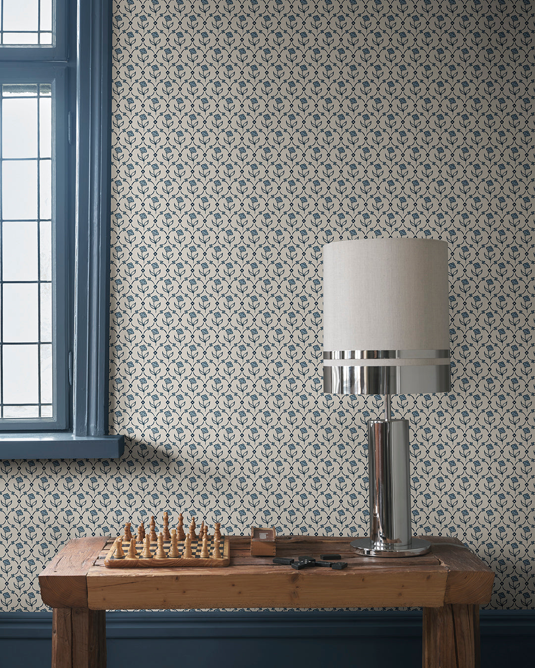 Elena Blue: A Timeless Floral Embrace
Elena in Blue offers a classic floral medallion design with echoes of domino paper and folk trellis patterns. This delicate print brings a touch of history, elegance, and charm to any room.