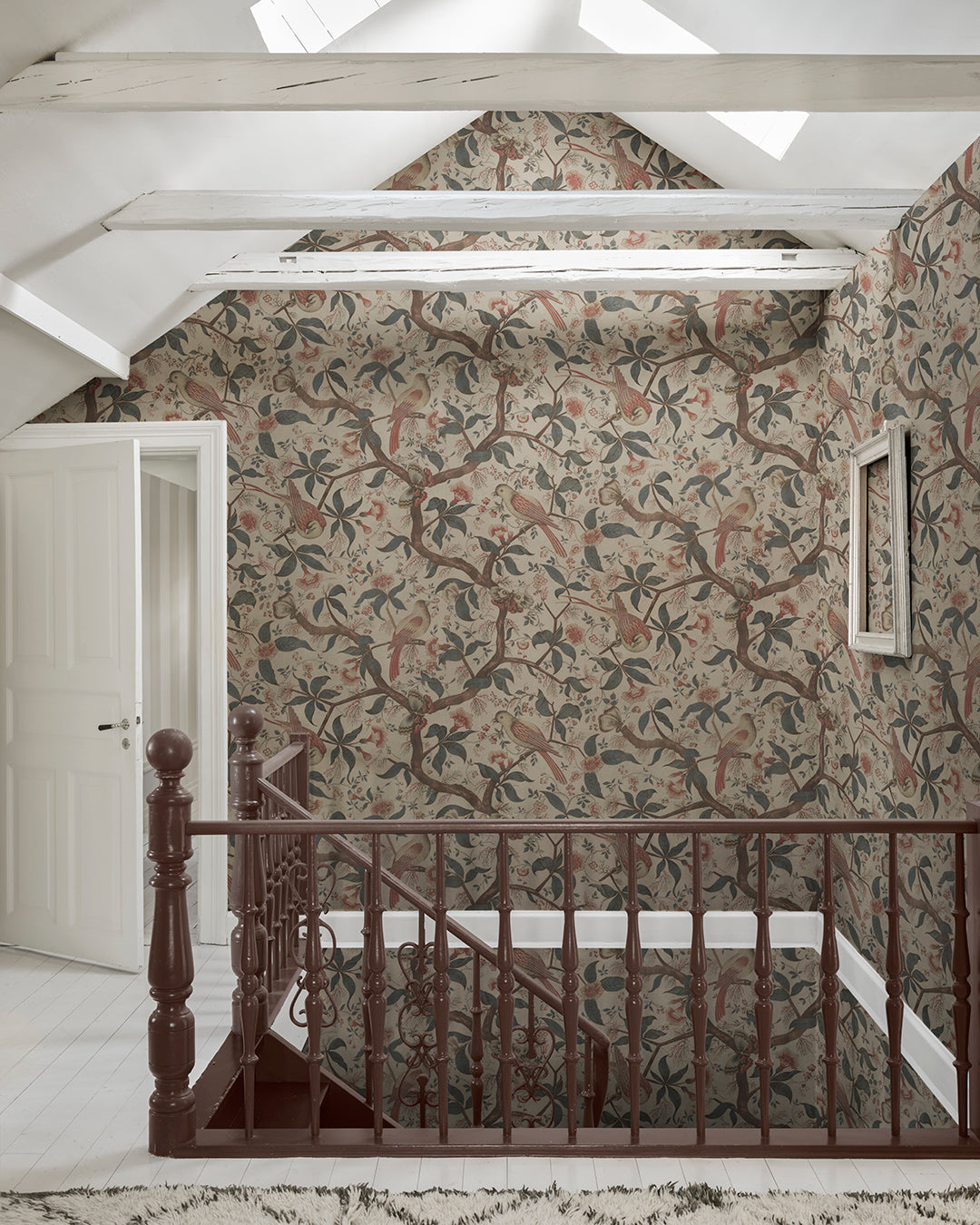 Immerse yourself in the elegance of Alexa Misty Blue. This wallpaper captures the charm of antique Southern European textiles with imaginative birds perched in a flourishing romantic tree. With its misty blue tones and detailed branches, it brings a soft, historical aesthetic to your space while whispering stories of a bygone era.