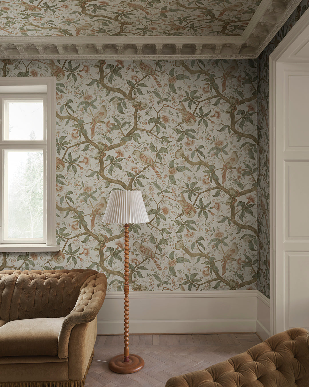 Bring the charm of antique Southern European textiles into your space with this elegant wallpaper. Flourishing trees adorned with imaginative birds create a mesmerizing garden scene on your walls. The Alexa design combines historical inspiration with a lush green palette for a stunning, timeless look.