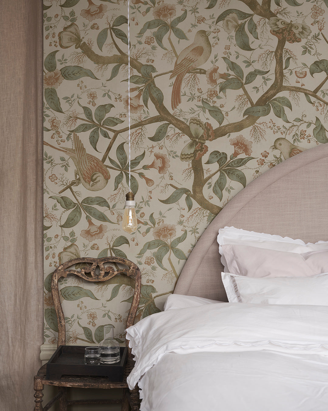 Bring the charm of antique Southern European textiles into your space with this elegant wallpaper. Flourishing trees adorned with imaginative birds create a mesmerizing garden scene on your walls. The Alexa design combines historical inspiration with a lush green palette for a stunning, timeless look.