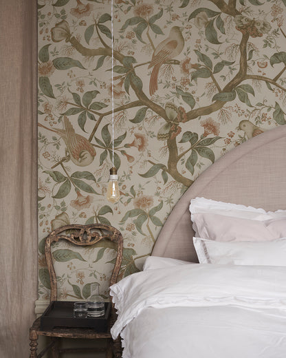 Bring the charm of antique Southern European textiles into your space with this elegant wallpaper. Flourishing trees adorned with imaginative birds create a mesmerizing garden scene on your walls. The Alexa design combines historical inspiration with a lush green palette for a stunning, timeless look.