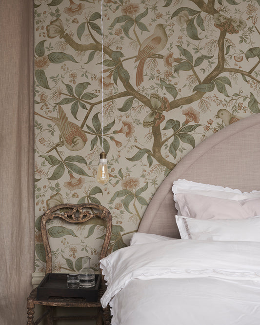 Bring the charm of antique Southern European textiles into your space with this elegant wallpaper. Flourishing trees adorned with imaginative birds create a mesmerizing garden scene on your walls. The Alexa design combines historical inspiration with a lush green palette for a stunning, timeless look.