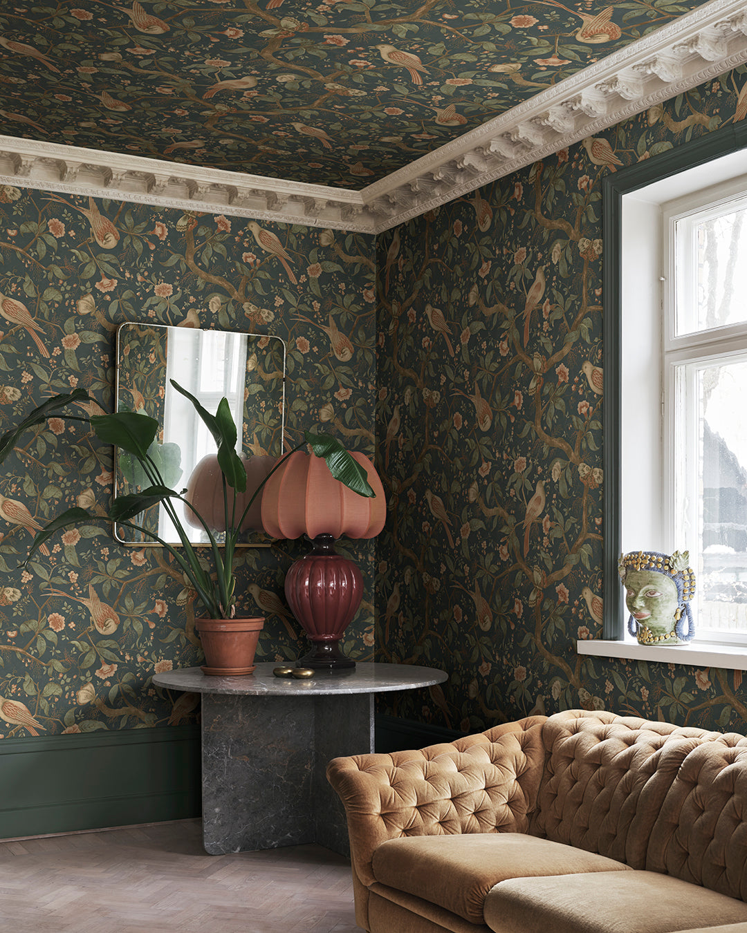 Inspired by an antique Southern European textile, the Alexa pattern blooms with imaginative birds amidst flourishing trees. This design envelops your space in historical charm and romance, all set against a soothing classic blue backdrop.