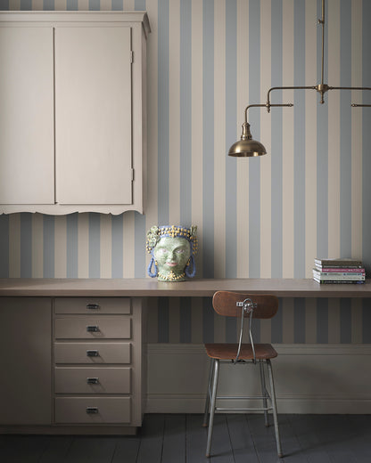 The Sam Light Blue Wallpaper introduces a refined elegance with its classic stripe pattern in calming blue tones. Perfect alone or paired with complementary designs, this wallpaper brings a hint of Southern European charm and sophistication to any space.