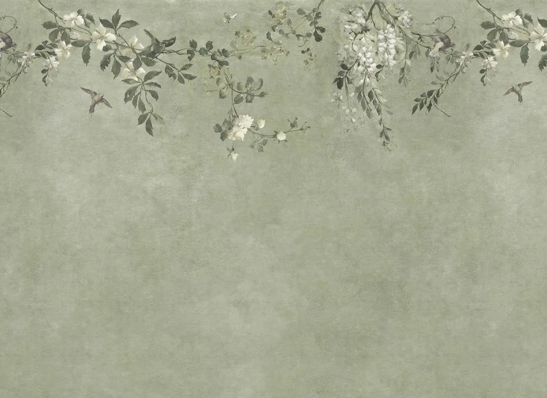 Embrace tranquil elegance with Nico's sage green backdrop, where delicate blooms and whimsical birds unite. This mural captures the enchanting charm of a classic Southern European pergola, creating a serene sanctuary with its exquisite floral details.