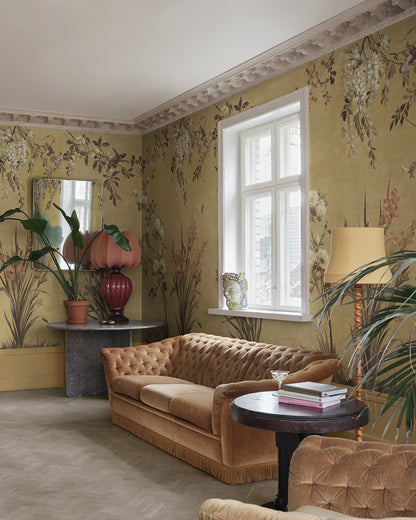 Dive into an antique European garden with the Nicola wallpaper—featuring hand-painted birds and graceful flowers on a patina backdrop.