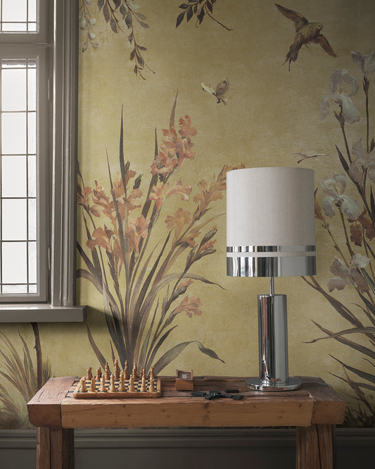 Dive into an antique European garden with the Nicola wallpaper—featuring hand-painted birds and graceful flowers on a patina backdrop.