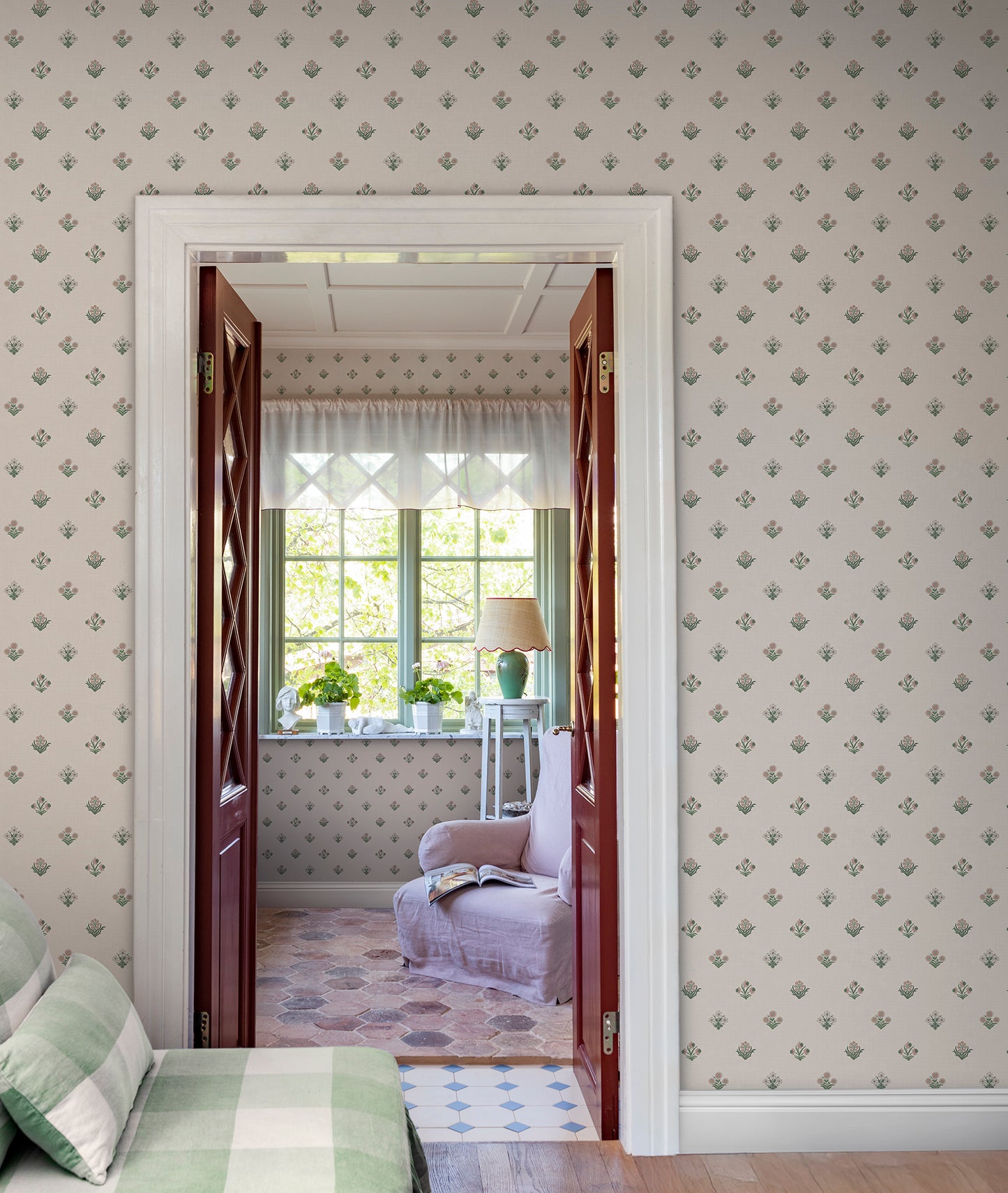 Infuse your space with Amy's charming wallpaper with delicate floral details. This subtle