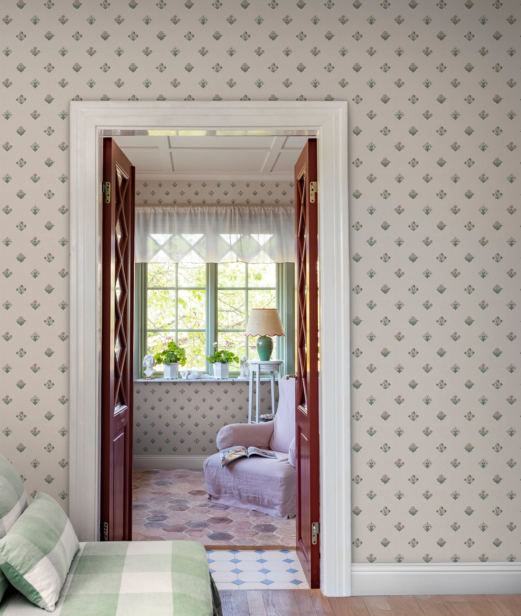 Infuse your space with Amy's charming wallpaper with delicate floral details. This subtle