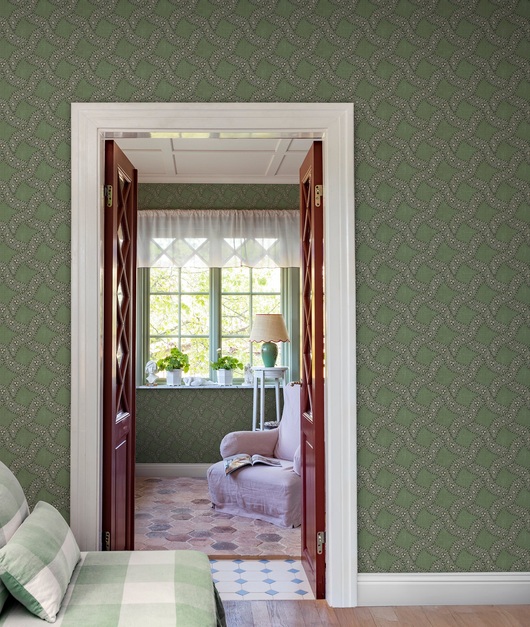 Step into the elegance of 18th-century French design with Annie's medallion pattern. This beautiful green wallpaper blends classic ornamentation with a modern twist