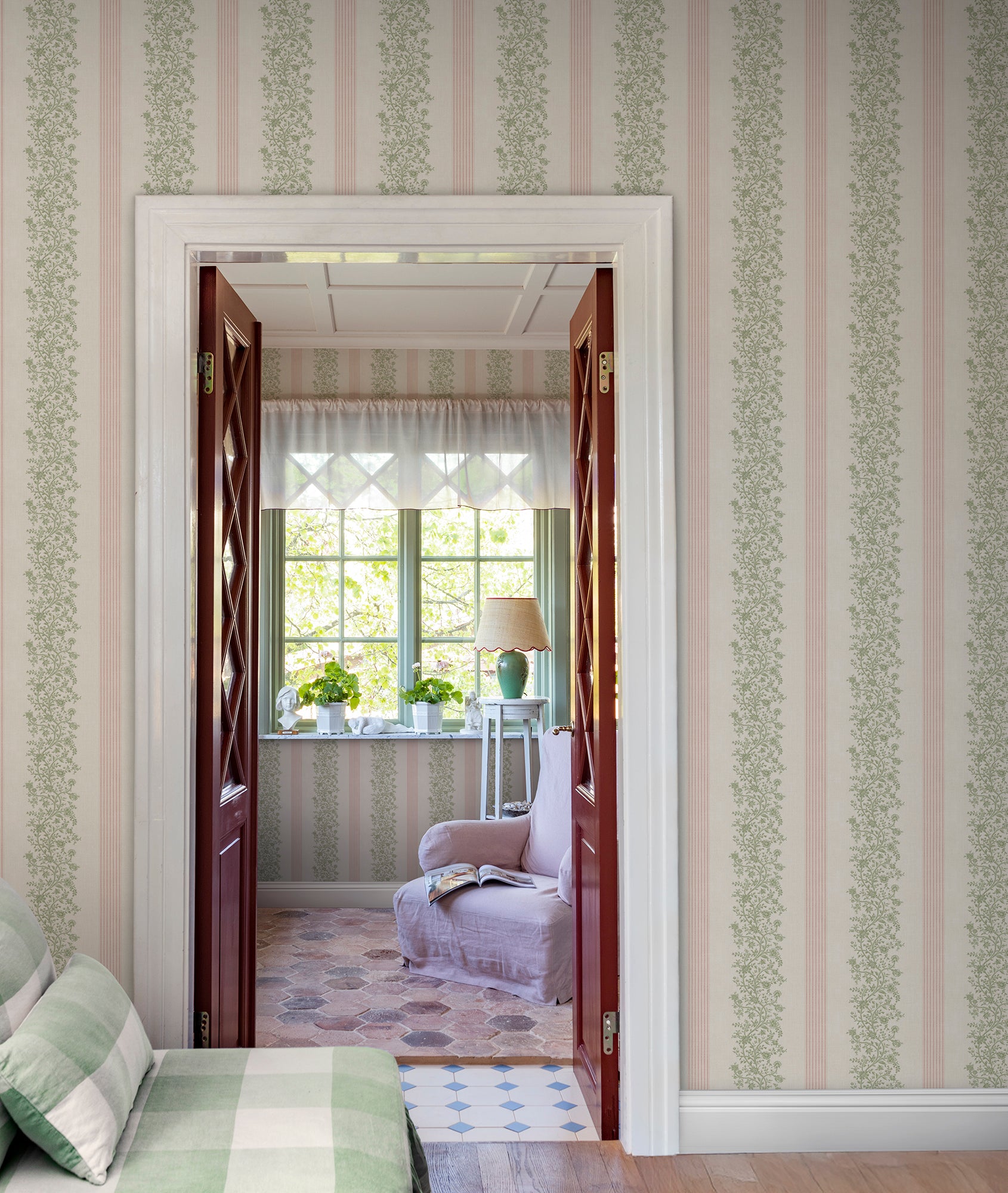 Embrace the romance of a classic stripe with Natalie Pink. This pattern intertwines delicate floral garlands with elegant woven stripes, revitalizing 19th-century French elegance in a modern palette