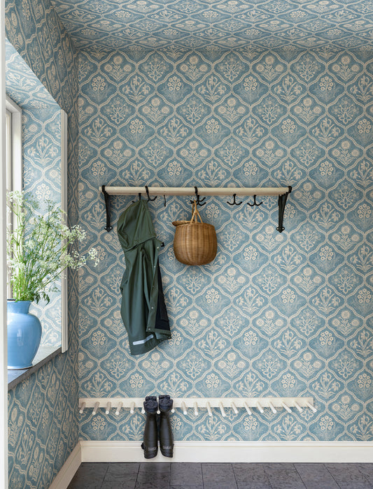  Experience the grace of 19th-century French elegance with the Rosa Blue wallpaper. 